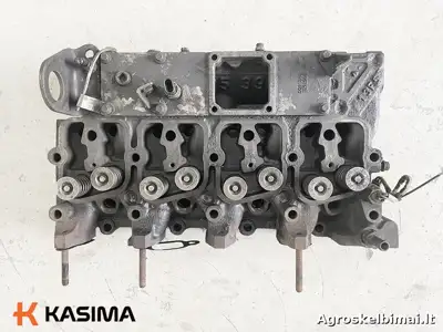 Parduodama „Komatsu“ SAA4D102E-2 variklio galva - Statybinė technika